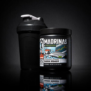 Cannister of Madrinas instant coffee next to shaker.